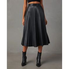 • High-Quality Material :Crafted from superior PU leather, this skirt offers a luxurious feel and long-lasting durability. Its perfect for the stylish woman who demands excellence in every garment. • Versatile Design :Featuring a pleated WAIST A-LINE design, this skirt is versatile enough to be dressed up or down for various occasions. Its large pleated cut adds a touch of elegance and sophistication. • Seasonal Wear :Ideal for autumn and winter, this skirt provides warmth and comfort during the Fitted Leather Pleated Skirt, Leather Pleated Skirt For Night Out, Chic Leather Pleated Skirt For Fall, Fall Midi-length Pleated Skirt, Spring Leather Midi-length Skirt, Faux Leather Lined Midi Skirt, Spring Leather Midi Skirt, Fitted Faux Leather Pleated Skirt For Fall, Faux Leather Pleated Skirt For Fall