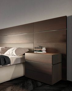 a bedroom with a bed, night stand and nightstand