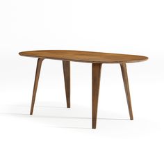 an oval wooden table with two legs on the top and one leg extended to the side