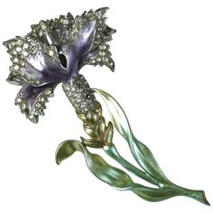 Collectible Marcel Boucher Retro Carnation brooch, of signature hand painted pearlized enamel in shades of pale greens, yellow, and lilac. The flower head of rhodium plate and crystal pave. Excellent Condition, Striking scale, Unsigned. L 3.75" x W 2 1/8". Coro Jewelry, Iris Flower, Purple Orchids, Antique Brooches, Iris Flowers, Pin Jewelry, Floral Jewellery, Flower Pins, Purple Flower