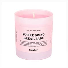 a pink candle that says you're doing great babe