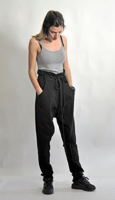 "Women Pants, Workout Pants, Drop Crotch Pants Amazing Drop-Crotch Women Pants. Yoga pants. Loose pants. With inside pockets, and fabric belt at the upper part that can be folded. Great for yoga or anywhere else. They are so comfortable and pleasant. Women Harem Pants. Great for all year seasons! Model on picture is wearing size S The style I used was originally designed and professionally constructed by me. Each item of my shop has a special package. Handmade in a pet-free and smoke- free envir Baggy Sweatpants With Hip Pockets, Black Tapered Leg Bottoms, Black Straight Pants With Hip Pockets, Baggy Straight Sweatpants With Hip Pockets, Black High-waisted Pants With Hip Pockets, Cotton Tapered Leg Harem Pants With Belt Loops, Black Tapered Leg Pants With Belt Loops, Cotton Harem Pants With Tapered Leg And Belt Loops, Cotton Harem Pants With Belt Loops And Tapered Leg