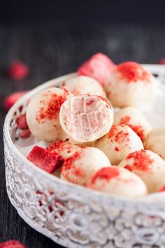 red and white desserts in a bowl on a table