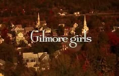 the words gummore girls are in front of a town