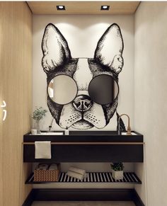 a bathroom with a dog drawn on the wall next to a mirror and sink area