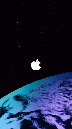 an apple logo is shown on top of the earth in this artistic photo taken from space