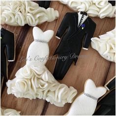 wedding cookies made to look like bride and groom's dress, shoes, and tuxedo