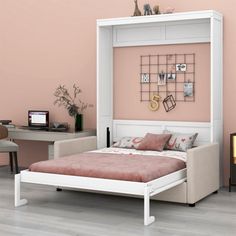 a bedroom with pink walls and white furniture