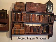 an old book shelf with many books on it