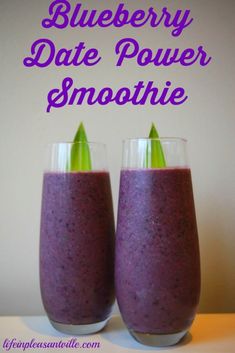 blueberry date power smoothie in two glasses with the words, blueberry date power smoothie