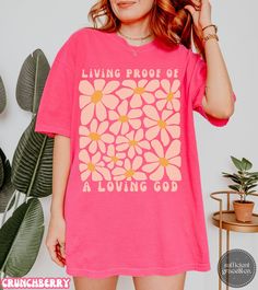 This beautiful Christian shirt for women features a vibrant retro boho floral design that is sure to stand out. The uplifting message, "Living proof of a loving God," adds a touch of positivity and faith to your everyday wardrobe. Made with high-quality materials, this shirt is both stylish and comfortable, making it a perfect addition to your collection. Spread love and share your faith with this unique and eye-catching piece. ✦ PRODUCT DETAILS ✦ ✔ Style: Comfort Colors 1717 Shirt Embrace timel Loving God, Bible Coloring, Cotton Crafts, Living Proof, Christian Shirt, Religious Gifts, Spread Love, Christian Shirts, Shirt For Women