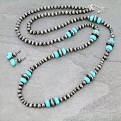 Navajo Style Pearls Necklace * New With Tag * Natural stones may vary in size, color, or shape * 48″ Navajo Style Pearl Necklace Set * Silver and Turquoise Color * Matching Earrings * made of natural stones, bead, alloy * nickel & lead free * It is not sterling sliver * All photos are stock photos Style Pearl Necklace, Necklace Set Silver, Hippie Cowgirl, Western Necklaces, Navajo Pearls, Navajo Style, Pearl Necklace Set, Pearls Necklace, Southwestern Jewelry