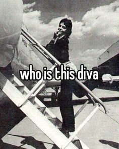 a man standing next to an airplane with the words who is this diva