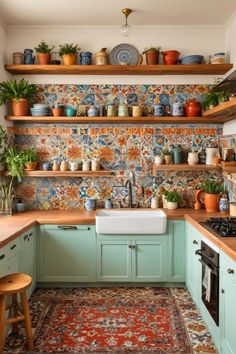 a kitchen filled with lots of pots and pans on top of wooden shelves next to a sink