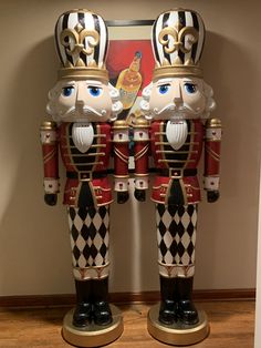 two nutcrackers are standing next to each other