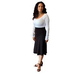 "Solid color A-line skirt is a great base for any top. Easy to pair with the tops you love and dress up or down! This skirt is pull on style, made of heavy weight cotton knit jersey, fold-over stretchy waist without zipper. It's not only comfy to wear with, but also makes your tummy look flat! Our versatile fold-over, a-line skirt is perfect for everyday wear. Can be made longer by not folding over the waist or shorter by folding over the waist band. The waist band is a yoga band, meaning no ela Knee-length Lined Skort, Relaxed Fit Solid Flared Skort, Flowy Full Skirt Solid Color Skort, Solid Color Flowy Full Skirt Skort, Flowy Full Skirt Skort, Fitted Flared Wrap Skirt For Fall, Stretch Midi Skirt With Gathered Details, Casual Fitted Flared Maxi Skirt, Classic Lined Skirt With Relaxed Fit