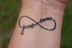 a wrist tattoo with the word'jocee'written in cursive writing