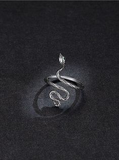 Add a touch of wild elegance to your jewelry collection with this stunning snake ring. Its intricate design and sparkling details make it the perfect accessory for any animal lover. Get ready to turn heads with this trending piece of animal-inspired jewelry Dark Punk, Serpent Ring, Country Rings, Snake Ring Silver, The Serpent, Bold Accessories, Snake Design, New Retro