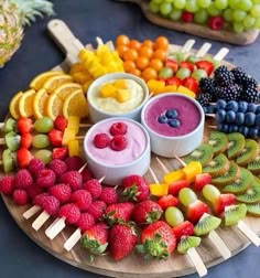 various fruits and dips arranged on a platter