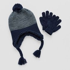 Ensure his head and hands stay warm when it's cold outside with this cute 2-piece Capelli of N.Y. big boys set. Made from a lightweight knit fabric, it includes a beanie with a faux fur trim and a pom at the top and matching gloves. # Pieces In Set: 2Included: 1 Hat(s), 1 Glove(s)Features: Faux Fur TrimWarmth Factor: LightweightFiber Content: 90% Acrylic, 10% PolyesterFabric Description: KnitLining: LinedLining Material: PolyesterCare: Tumble Dry, Machine WashCountry of Origin: Imported It's Cold Outside, Boys Set, Its Cold Outside, Cold Outside, It's Cold, Lightweight Knit, Winter Accessories, Big Boys, Fur Trim