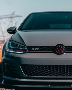 the front end of a gray volkswagen golf gt