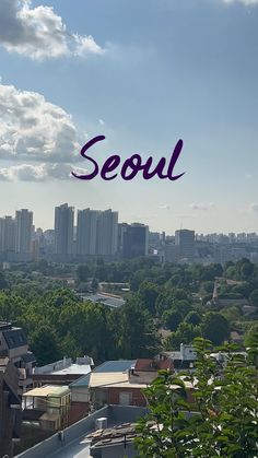 the words seoul are in front of an image of cityscape with trees and buildings