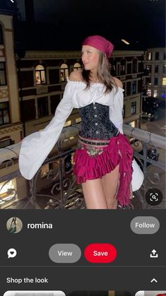 a woman in a corset is standing on a balcony