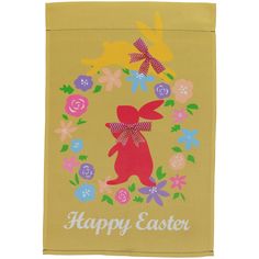 a yellow towel with an image of a bunny in a wreath on it that says happy easter