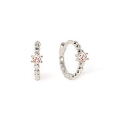 Minimal Silver Huggie earrings with sparkly Pink gemstone details. Perfect to wear alone or paired with other dainty earrings. .925 Sterling Silver Pink CZ Crystals Hypoallergenic, lead and nickel free Hoop Width: 1.5mm, Crystal 3mm Inside Diameter:8.5mm Click close mechanism #E552 gemstone-bead-huggies-pink-sapphire-sterling-silvergemstone-bead-huggies-emerald-sterling-silvergemstone-bead-huggies-blue-sapphire-sterling-silvergemstone-bead-huggies-blue-zircon-sterling-silver Silver Huggie Earrings, Small Silver Hoop Earrings, Huggie Earrings Silver, Pave Beads, Pink Gemstones, Huggie Earrings, Huggie Hoop Earrings, Dainty Earrings, Single Earring