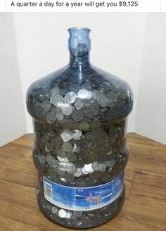 a large glass jar filled with lots of coins