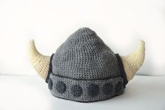 a crocheted hat with horns on it