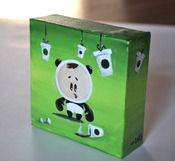 a small green bag with a panda on it