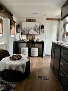 a living room filled with furniture and decor