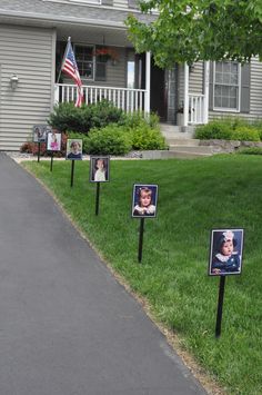 the front yard of a house with pictures on it