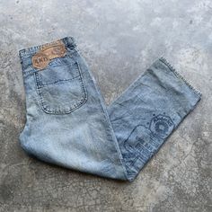 Vintage Akademiks Baggy Denim Jeans. Size fits 38". Still in great condition. A few stains/marks at front and back. Printed graphic. Overall condition is 8/10. Weight : 800g Please check the measurement below.Measurements are taken laid flat. Waist : 38 inches Length : 46 inches Inseam : 33 inches Rise : 13 inches Thigh : 14 inches Knee : 11 inches Leg : 10 inches Thank you #EphBou12-23 Baggy Vintage Cotton Cargo Jeans, Vintage Baggy Denim Pants, Vintage Cotton Cargo Jeans For Streetwear, Vintage Baggy Cargo Jeans In Medium Wash, Vintage Cotton Cargo Jeans With Relaxed Fit, Vintage Denim Blue Cargo Jeans For Streetwear, Vintage Straight Leg Cargo Jeans For Streetwear, Vintage Relaxed Fit Cotton Cargo Jeans, Vintage Baggy Straight Leg Jeans