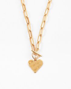 We added our Hammered Heart Toggle Necklace to our permanent collection / made with a hammered heart and a thick rectangle chain, this one fastens with a toggle in the front and is a staple! We love this cool & polished piece. Equal parts chic & effortless. Choose self love and add good vibes to your necklace collection. *16 inches in length* Heart Toggle Necklace, Dream Things, Toggle Necklace, Necklace Collection, Scarf Headband, Gold Paper, Accessories Jewelry Earrings