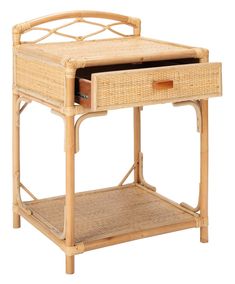 the side table has two drawers and is made out of bamboo with wicker handles