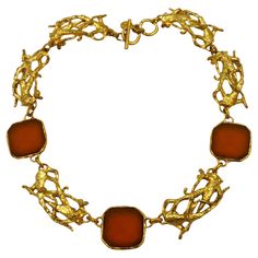 XAVIER LOUBENS vintage gold tone link necklace featuring an intricated design, embellished with 3 large frosted glass cabochons in amber colour. T-bar toggle loop closure. Marked XAVIER LOUBENS Paris Made in France. Indicative measurements : adjustable length from approx. 43 cm (16.93 inches) to approx. 44.5 cm (17.52 inches) / max. width approx. 2.5 cm (0.98 inch). Material : Gold tone metal hardware / Glass. NOTES - This is a preloved vintage item, therefore it might have imperfections. - Colo Luxury Gold Cabochon Necklace, Cabochon Necklace, Amber Color, Choker Necklaces, Link Necklace, Metal Hardware, Gold Tone Metal, Frosted Glass, Vintage Gold