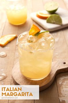 a close up of a drink on a wooden table