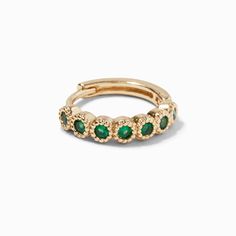 They'll be green with envy when they see you in this faux emerald cartilage earring. It has a gold-tone design that is accented by bezel-set faux emeralds in a clicker design. Finish: Gold-tone Size: 18G/1.0mm Closure: Clicker hinge Material: Metal - Claire's Gold 18G Emerald Cartilage Clicker Earring Trendy Green Stackable Jewelry, Yellow Gold Emerald Huggie Jewelry, Single Green Round Earring, Green Single Round Earring, May Birthstone Huggie Earrings, Trendy Green Huggie Jewelry, Adjustable Green Cartilage Earrings As Gift, Green Gemstone Small Hoop Jewelry, Single Emerald Earring For May Birthstone