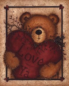 a brown teddy bear holding a red heart