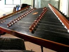 a close up of a musical instrument on a table