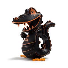 an animal figurine is standing on its legs and has it's mouth open