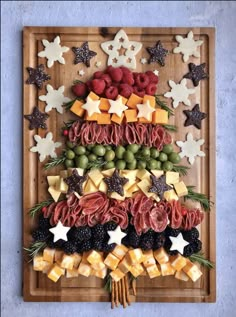 a wooden tray filled with different types of food