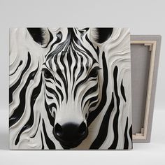 a zebra's head is painted on the side of a wooden frame, with black and white stripes