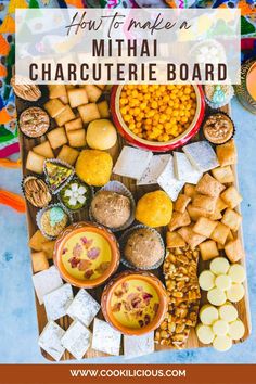 a wooden tray filled with different types of food and text overlay reads how to make a mitchell charcuterie board