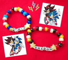 two bracelets with cartoon characters on them and some stickers next to each other