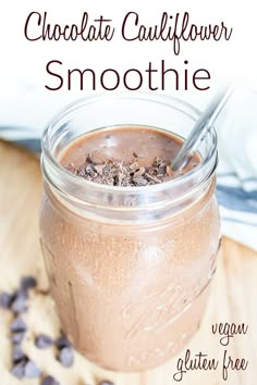 chocolate cauliflower smoothie in a mason jar on a wooden table with text overlay