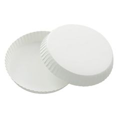 two white paper plates sitting next to each other