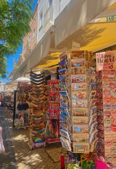 an outdoor market with lots of items for sale